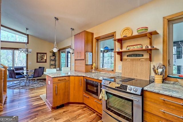 kitchen featuring electric stove, brown cabinets, light wood-style floors, vaulted ceiling, and built in microwave