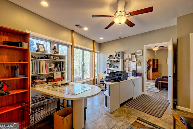 office area featuring visible vents and recessed lighting