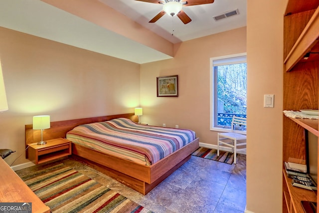 bedroom with a ceiling fan, visible vents, and baseboards