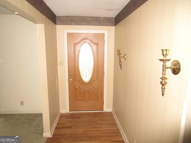 doorway to outside featuring hardwood / wood-style floors