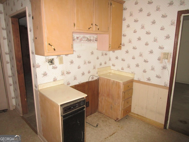 kitchen featuring black oven