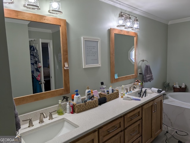 bathroom with a washtub, crown molding, and vanity