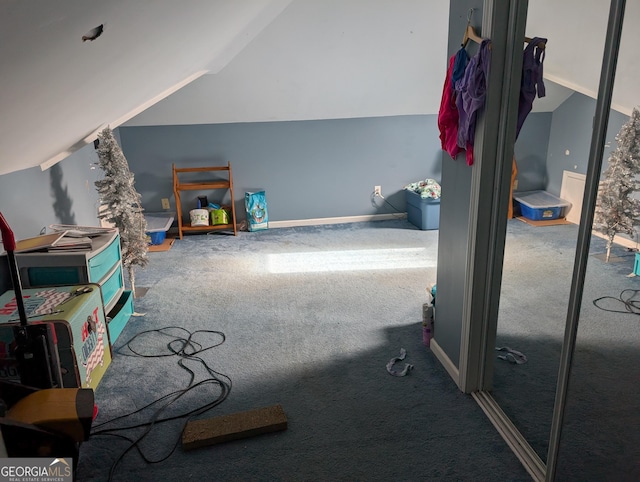 bonus room featuring carpet flooring and lofted ceiling