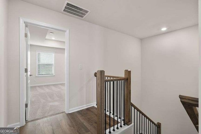 hallway featuring dark hardwood / wood-style floors