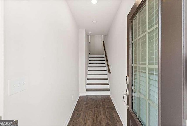 hallway featuring dark wood-type flooring