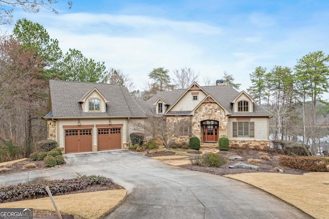 view of front of property with a garage