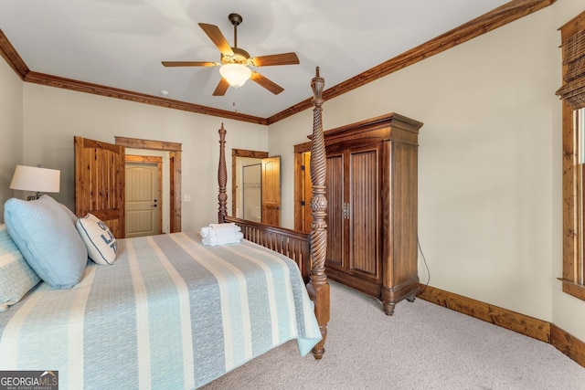 carpeted bedroom with crown molding and ceiling fan