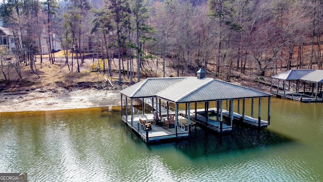 dock area featuring a water view