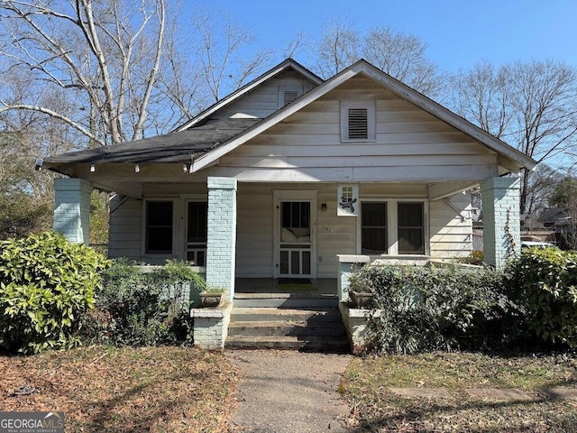 bungalow-style home featuring a porch