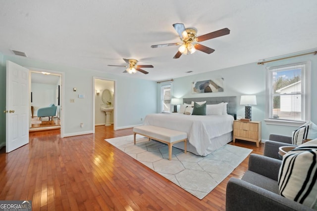 bedroom featuring ceiling fan and light wood-type flooring