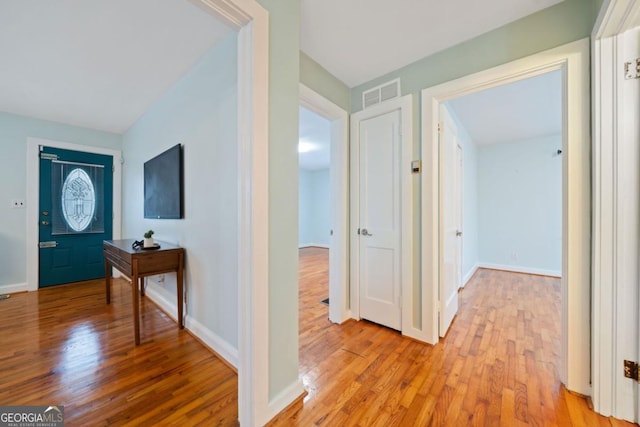 hallway featuring light wood-type flooring