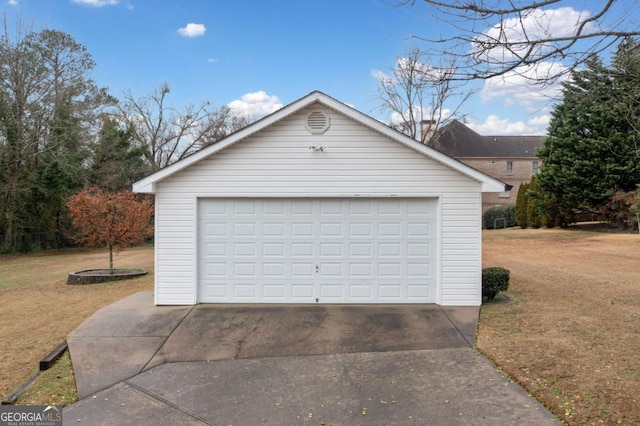 garage with a yard