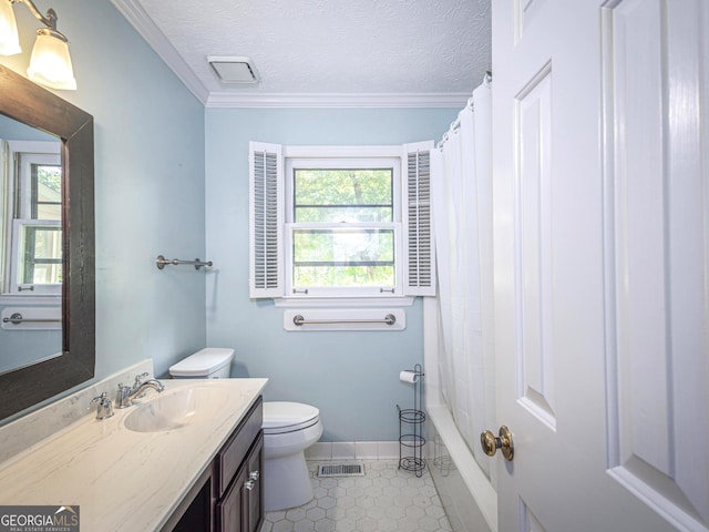 full bathroom featuring crown molding, vanity, toilet, and a textured ceiling