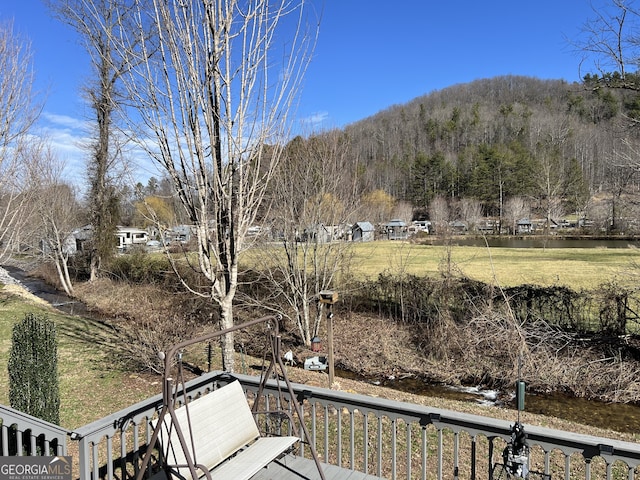 mountain view featuring a water view