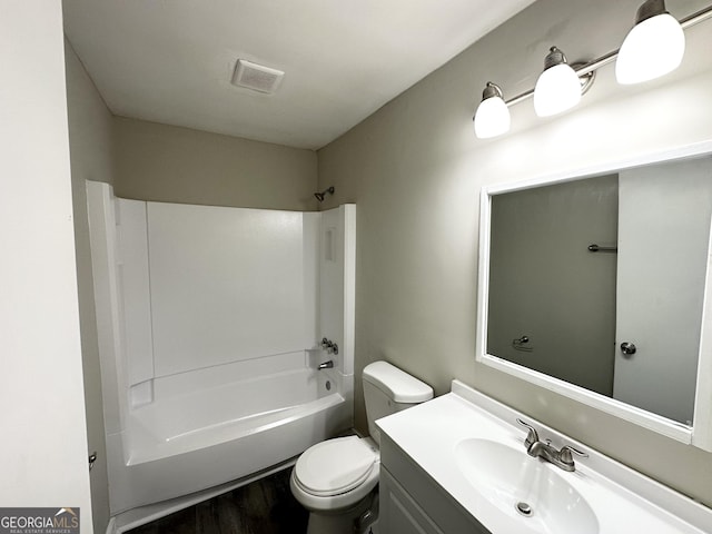 full bathroom with shower / tub combination, vanity, and toilet