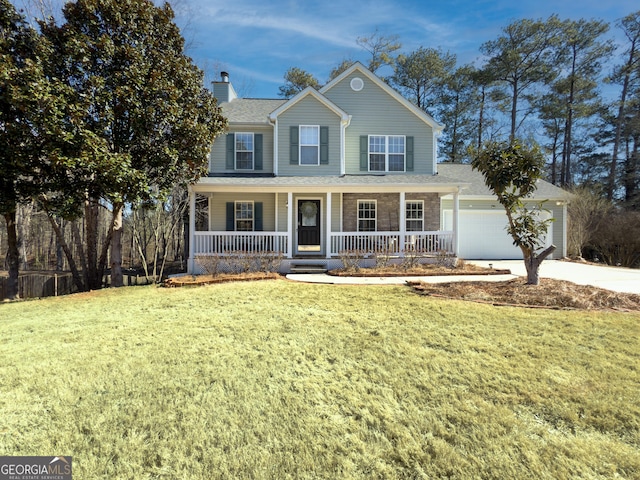 view of front facade featuring a garage, a front lawn, and a porch