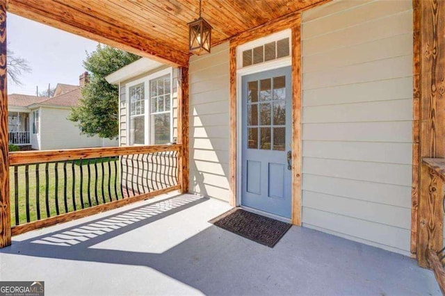 entrance to property with a porch