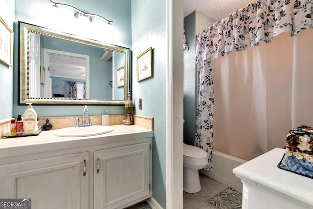 full bathroom featuring shower / bathtub combination with curtain, vanity, a textured ceiling, tile patterned floors, and toilet