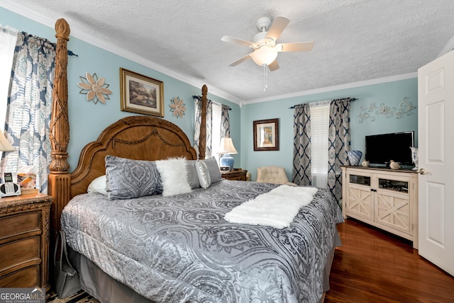 bedroom with crown molding, ceiling fan, dark hardwood / wood-style flooring, and a textured ceiling