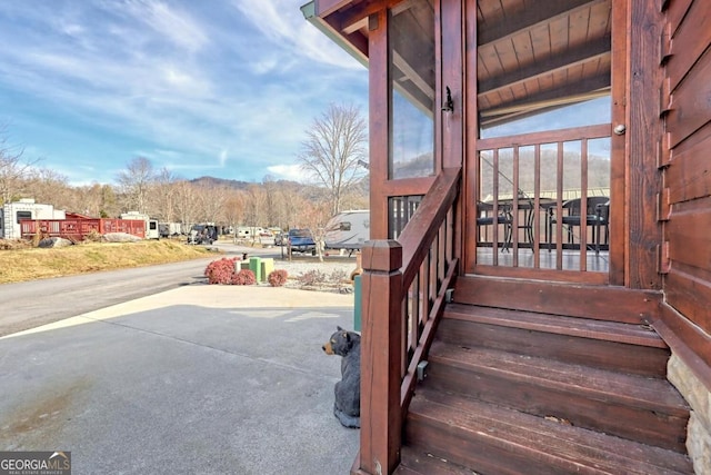 stairway featuring a mountain view