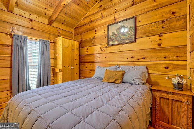 bedroom with vaulted ceiling, wooden ceiling, and wood walls