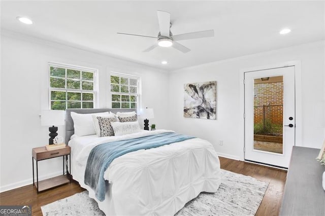 bedroom featuring baseboards, dark wood-style floors, ceiling fan, crown molding, and recessed lighting