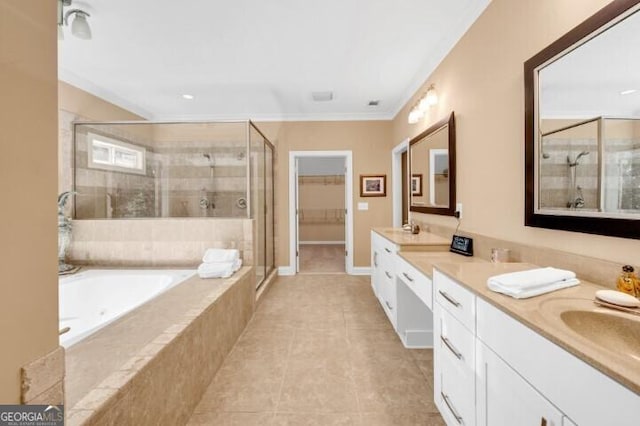 bathroom featuring tile patterned floors, separate shower and tub, crown molding, and vanity