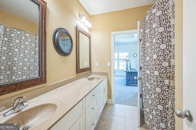 bathroom with vanity and tile patterned floors