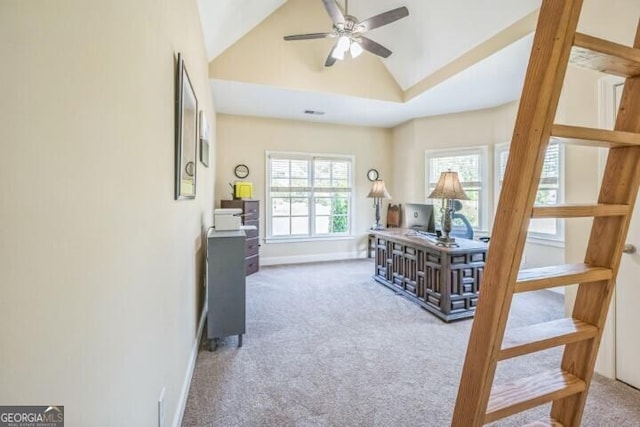 interior space featuring carpet and vaulted ceiling