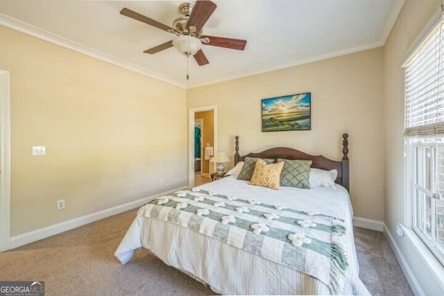 bedroom featuring ceiling fan, ornamental molding, and light carpet