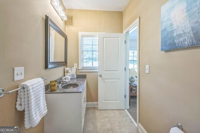 bathroom featuring tile patterned floors and vanity