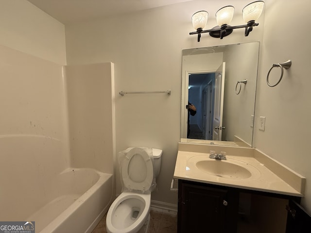 full bathroom with shower / washtub combination, vanity, and toilet