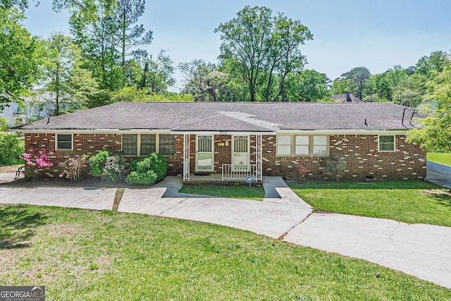 3710 Lynn Dr, Powder Springs, GA 30127 - ranch-style house with brick siding and a front yard