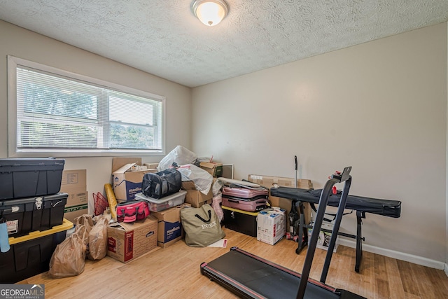 3710 Lynn Dr, Powder Springs, GA 30127 - interior space featuring baseboards, wood finished floors, and a textured ceiling