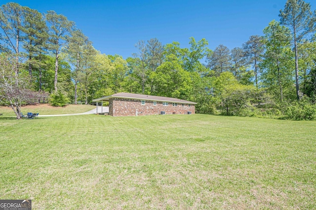 3710 Lynn Dr, Powder Springs, GA 30127 - view of yard with a forest view