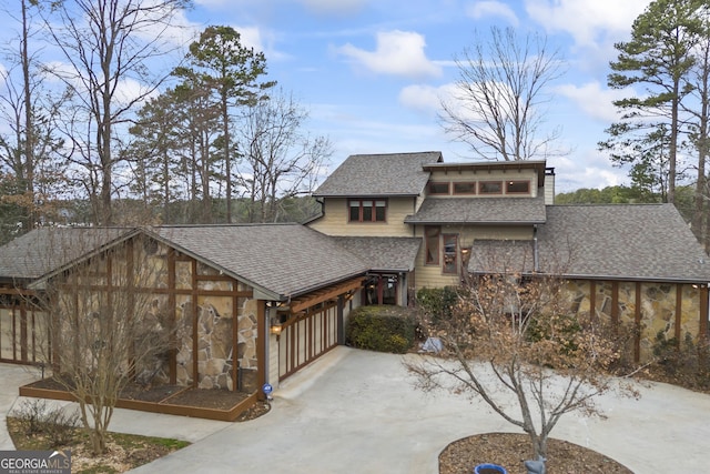 view of front of property with a garage