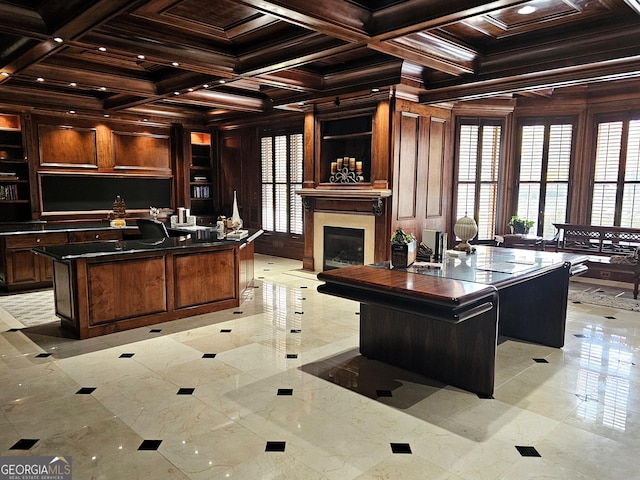 office with beamed ceiling, ornamental molding, coffered ceiling, and wood walls