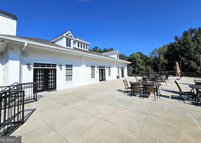 view of patio featuring french doors