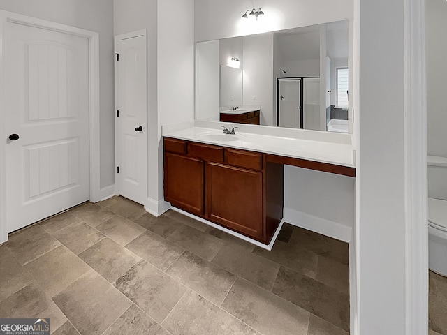 bathroom with vanity and walk in shower