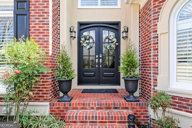 doorway to property with french doors