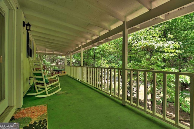 balcony featuring a porch