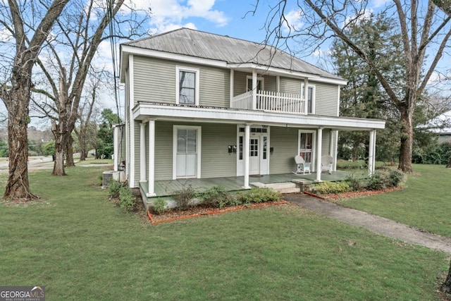 view of front of property with cooling unit, a balcony, covered porch, and a front lawn