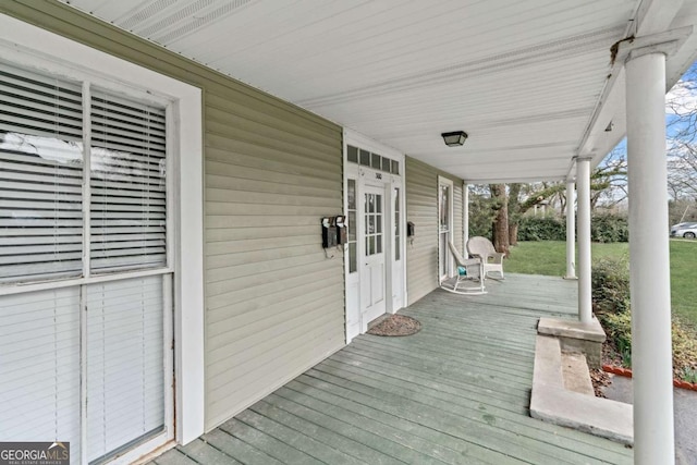 deck featuring covered porch