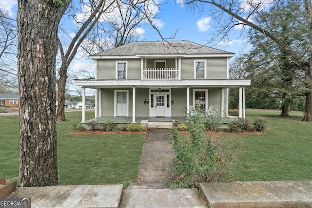 view of front of property featuring a porch and a front lawn