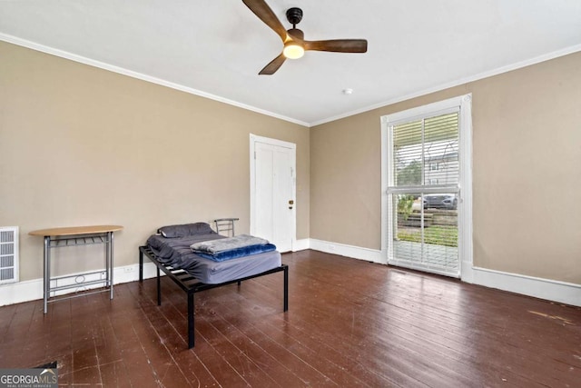 living area featuring crown molding, ceiling fan, and dark hardwood / wood-style flooring