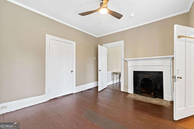 unfurnished living room with dark hardwood / wood-style flooring, crown molding, and ceiling fan