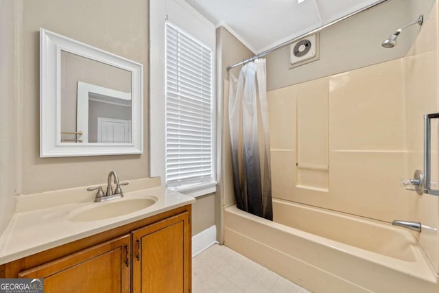 bathroom featuring vanity and shower / tub combo with curtain