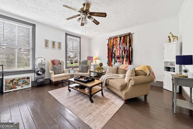 living room featuring a textured ceiling, dark hardwood / wood-style floors, and ceiling fan