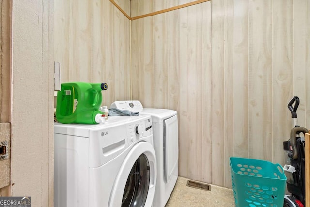 washroom featuring separate washer and dryer