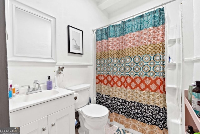 bathroom with vanity, a shower with curtain, and toilet